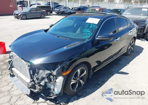 2016 Honda Civic Touring z USA, uszkodzony, nr VIN 2HGFC1F96GH108031